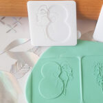 Osmica sa likom žene